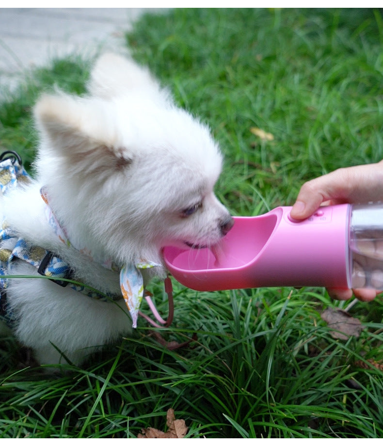 Portable dog water bottle with built-in dispenser for travel and outdoor use