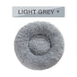 Donut dog bed soft plush calming pet bed with raised edges for dogs and cats