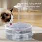 Cat drinking from AquaFlow suspended flying saucer pet water fountain with circulating water stream