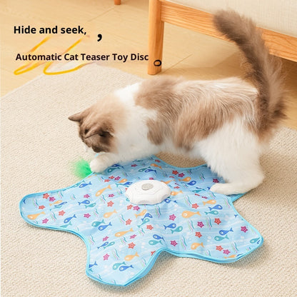 Fluffy cat playing with the Peekaboo TM automatic cat teaser hidden movement disc